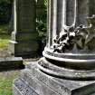 Detail of ionic column on gravestone in memory of Clement Paton in foreground. Background includes view of gravestone in memory of John Fyfe. Newington Cemetery, Edinburgh.