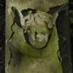 Detail of relief showing cherub's face from gravestone fragment, Newington Cemetery, Edinburgh.