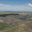 Oblique aerial view of Glenbuck Open Cast Mine, looking to the N.