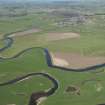 General oblique aerial view of the Upper Clyde Valley centred on the village of Cartsairs, looking to the W.