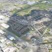 Oblique aerial view of the construction of the Glasgow Commonwealth games site, looking to the NE.