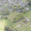 Oblique aerial view of New Pitsligo Parish Church, looking to the SE.