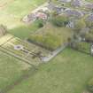 Oblique aerial view of New Pitsligo Parish Church, looking to the NE.