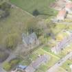 Oblique aerial view of New Pitsligo Parish Church, looking to the NW.