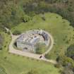 Oblique aerial view of Cairness House, looking to the N.