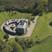 Oblique aerial view of Cairness House, looking to the ESE.