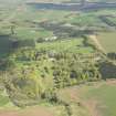 General oblique aerial view of Auchamoy Estate centred on Auchamoy House, looking to the NE.