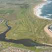 General oblique aerial view of Craigewan Links centred on Peterhead Golf Courses, looking to the N.