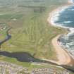 General oblique aerial view of Craigewan Links centred on Peterhead Golf Courses, looking to the N.