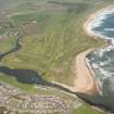 General oblique aerial view of Craigewan Links centred on Peterhead Golf Courses, looking to the N.