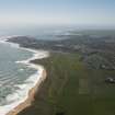 General oblique aerial view of Craigewan Links centred on Peterhead Golf Courses, looking to the S.