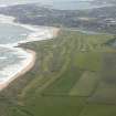 General oblique aerial view of Craigewan Links centred on Peterhead Golf Courses, looking to the SSE.