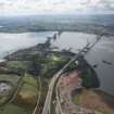 General oblique aerial view of the River Forth centred on the Forth Road Bridge, looking to the S.