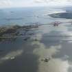 General oblique aerial view of the River Forth centred on the Forth Road Bridge, looking to the E.