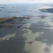 General oblique aerial view of the River Forth centred on the Forth Road Bridge, looking to the E.