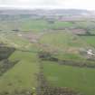 Oblique aerial view of Kirknewton Airfield, looking to the S.