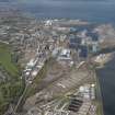 General oblique aerial view of Leith Docks centred on the Western Harbour, looking to the NW.