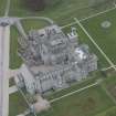Oblique aerial view of Dunecht House and chapel, looking to the ESE.