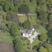 Oblique aerial view of Corsindae House with adjacent walled garden, looking to the ENE.