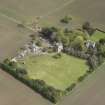 Oblique aerial view of Tillycairn House, looking to the E.