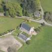 Oblique aerial view of Cluny Parish Church, looking to the E.