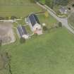 Oblique aerial view of Cluny Parish Church, looking to the NE.