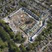 General oblique aerial view of the construction site of Oakhill Grange Housing Estate on the site of the former Oakbank Approved School, looking to the SSE.