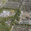 General oblique aerial view of the construction site of Oakhill Grange Housing Estate on the site of the former Oakbank Approved School with Beechwood School adjacent, looking to the ENE.