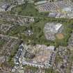 General oblique aerial view of the construction site of Oakhill Grange Housing Estate on the site of the former Oakbank Approved School with Beechwood School adjacent, looking to the NNW.