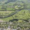 General oblique aerial view of the Aspire Golf Centre with Deeside Golf Course adjacent, looking to the SSE.