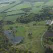 General oblique aerial view of Dunecht House estate centred on Dunecht House with adjacent Dunecht Golf Course, looking to thee SW.