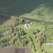 General oblique aerial view of Monymusk House estate centred on Monymusk House, looking to the N.