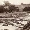 Stair Bridge from south east. Weir under reconstruction taken from lade intake for Water of Ayr Hone Works, Dalmore Mill. From family album of Mr K Montgomerie. Survey of Private Collection