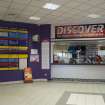 Interior. View of reception desk and concourse into centre