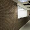 Interior. View from North along squash court viewing corridor.