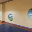 Interior. View of later wall erected within the central corridor, separating the ice rink and carpet bowls halls.