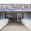 View looking along footbridge to the main entrance of the Magnum Centre.