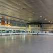 Interior. View from south west, looking across the ice rink to the viewing balcony and cantilevered dance studio.