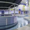 Interior. View looking west within the extension of the swimming pool hall.