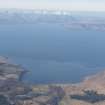 General oblique aerial view of Applecross Bay with Skye in the distance, looking WSW.
