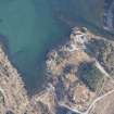 Oblique aerial view of the fish trap and the building, looking N.