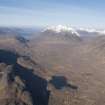 General oblique aerial view of Liathach, the Coire Dubh Mor and Beinn Eighe with the River Torridon and Loch Bharranch in the foreground, looking WNW.