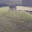 Oblique aerial view of Corsehope Rings, looking SE.