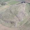 Oblique aerial view of Traprain Law, looking NE.