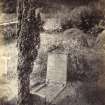 View of a 19th century grave slab, that of Edward Bethell Codrington, in the graveyard of Kilchrenan Parish Church, Kilchrenan and Dalavich, Argyll.
Titled: '136. in Kilchrenan Churchyard.'
PHOTOGRAPH ALBUM NO 186: J B MACKENZIE ALBUMS vol.1