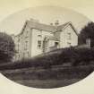 View of the formerly known Kilmartin Manse, now the Kilmartin House Museum, Kilmartin, Argyll and Bute. Vignetted Image.
Titled: '174. Kilmartin Manse.'
PHOTOGRAPH ALBUM NO 186: J B MACKENZIE ALBUMS vol.1