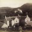 View of Colonsay Hotel in forground with group of figures, and Colonsay Parish Church in the Background at Scalasaig, Colonsay, Argyll.
Titled: '186. Hotel and Church, Colonsay, Argyllshire.'
PHOTOGRAPH ALBUM NO 186: J B MACKENZIE ALBUMS vol.1