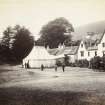 View of Kenmore village centre with tent and Kenmore Parish Church in background.
Titled: '194. Kenmore Village and Martar.'
PHOTOGRAPH ALBUM NO 186: J B MACKENZIE ALBUM
