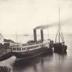 View of coaling steamship known as 'Chavalier' moored at Crinan Harbour, Crinan Loch, North Knapdale.
Titled: '41. "Chevalier" coaling at Crinan.'
PHOTOGRAPH ALBUM, NO 186: J B MACKENZIE ALBUMS vol.1