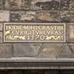 Detail of plaque on front elevation of Huntly House Museum, 142-146 Canongate, Edinburgh.